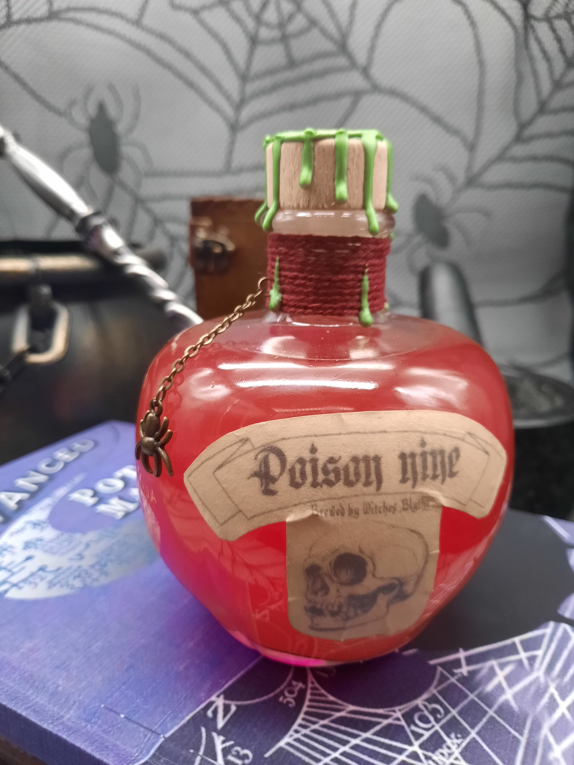 Red Poison potion in Apple shaped bottle